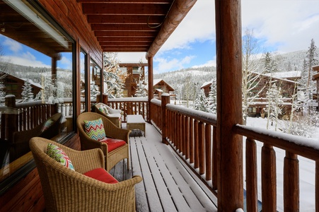 Enjoy snowy views from the covered deck,