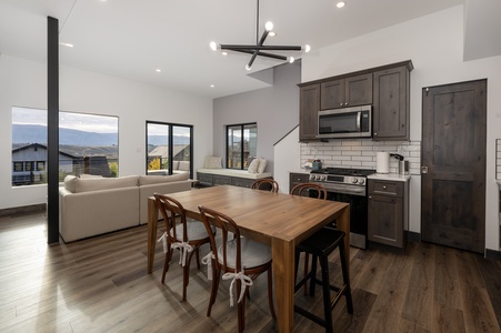 Cozy compact kitchen with modern lighting and decor