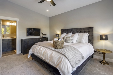 - Bedroom with plush king bed and stylish modern décor for comfort   - Flat screen TV and dresser included for entertainment and storage   - Relaxing Colorado mountain retreat designed for restful nights