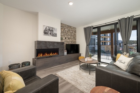 Modern living room with a stone electric fireplace,