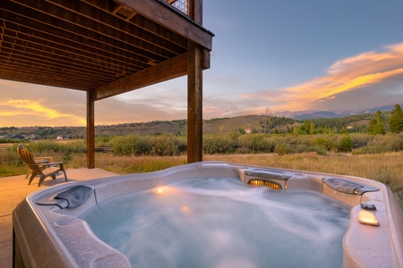 - Relax in private hot tub overlooking Colorado mountains   - Sunset views and bubbling spa for ultimate comfort   - Scenic outdoor amenity ideal for mountain cabin stays