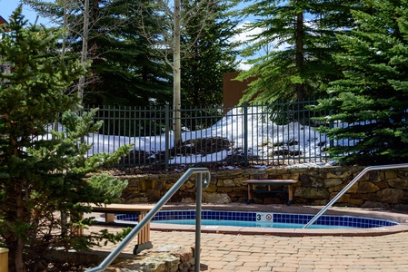 One of two Riverside Hot Tub at Zephyr Mountain Lodge