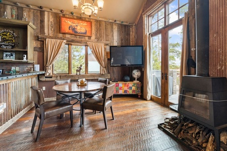 Rustic decor with lots of windows bathing the rooms with natural light