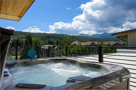 - Soak in the bubbling hot tub while soaking up jaw dropping views of the mountains beyond - Lounge on the spacious patio with a backdrop of pine trees and sweeping blue skies - Perfect for après ski relaxation or a starlit summer evening unwind
