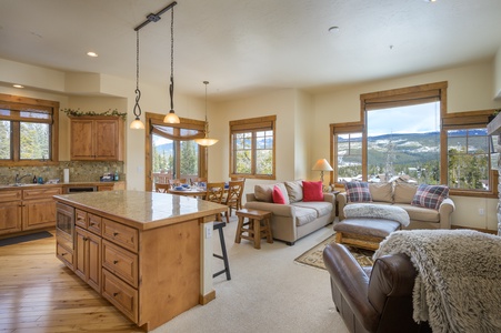 The open concept main floor has a large living room, a formal dining room, and a gourmet kitchen.