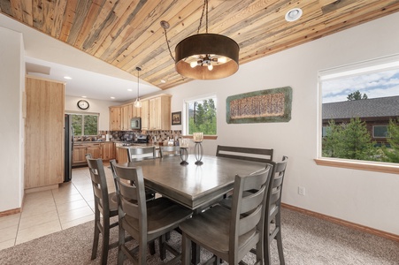 Dining area with windows bathing the space in natural light