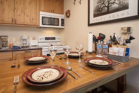 A wooden island in the kitchen for your dining in needs