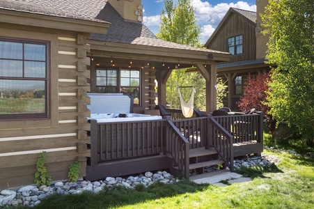 Unwind in your private outdoor hot tub with golf course and mountain views.