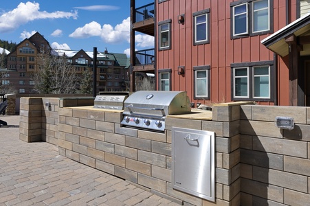 Shared amenities deck with grill area