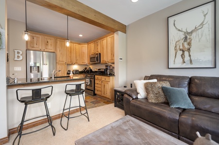 This home features a well stocked kitchen and an open concept living area