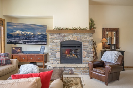 Unwind in the spacious living room around a gas fireplace.