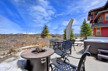 Outdoor patio with fire pit and a breath taking view