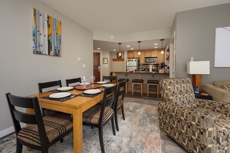 - Dining area with seating for six and open kitchen access   - Bright modern space designed for family meals and gatherings   - Convenient setup for après ski dinners and vacation nights