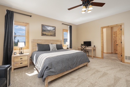 - Spacious bedroom with king bed and soft bedding for restful nights   - Work desk and chair provide a quiet space for remote work stays   - Large windows fill the room with natural light and mountain views