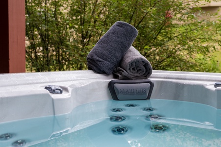 Unwind in our private outdoor hot tub after a day on the mountain