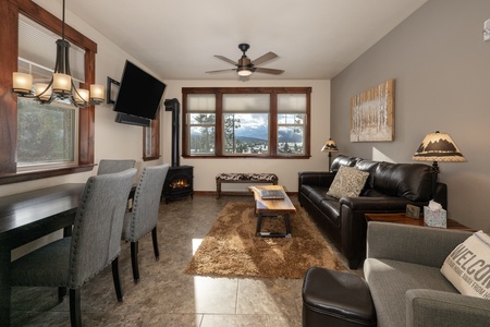 Open living Area with Gas Fireplace and stunning Mountain Views