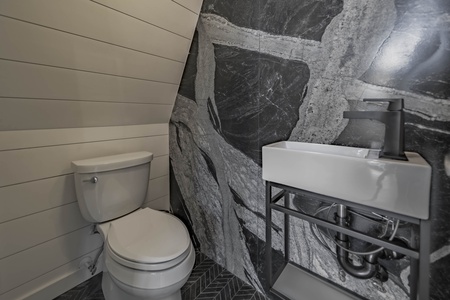AFrame of Style - Half Bathroom with Granite Wall