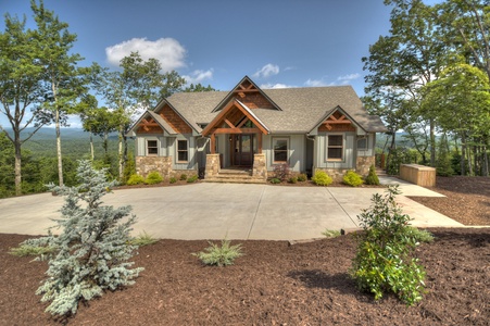 New Heights- Front exterior view of the cabin and driveway area