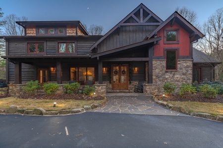 River Joy Lodge- Front View of Cabin at Dusk