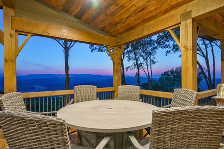 Alpine Vista - Entry Level Deck Dining Area at Dusk