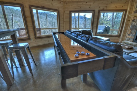 Whisky Creek Retreat- Lower level game area with shuffleboard table