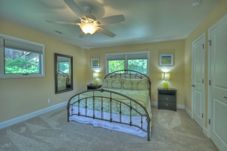 Jump Right In- Upstairs bedroom with a mirror and closet space
