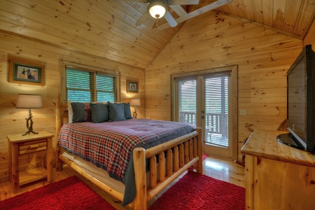Luxury At The Settlement- Upper level master bedroom with deck access