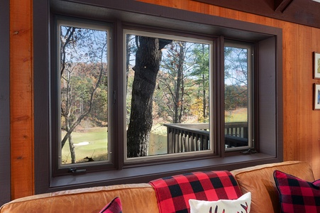 Chickadee's Lake Lookout - Living Room Offers Views of Lake Sconti and Golf Course