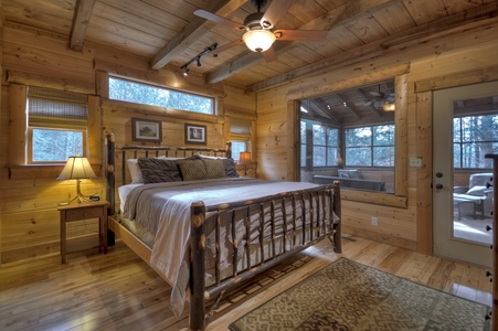 Reel Creek Lodge- Entry level king bedroom with balcony access