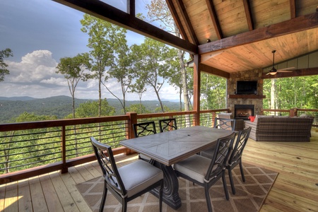 New Heights- Outdoor dining area with mountain views