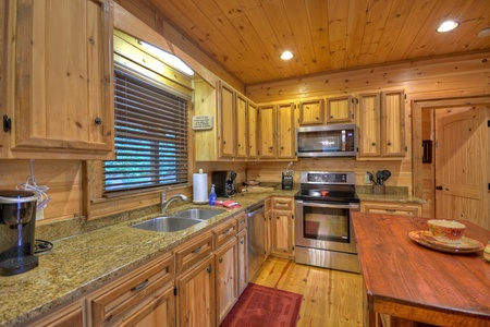 Luxury At The Settlement- Full kitchen view with appliances