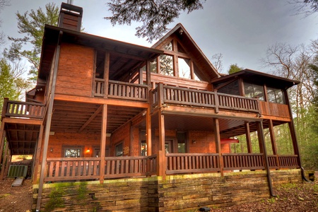 Reel Creek Lodge- Exterior view of the cabin with deck views