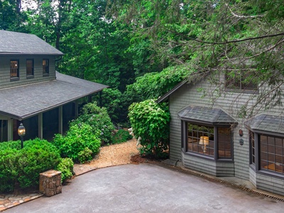 Gleesome Inn- Main and guest cabins perspective from the driveway