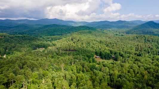 Feather & Fawn Lodge- Long range aerial view of the mountains