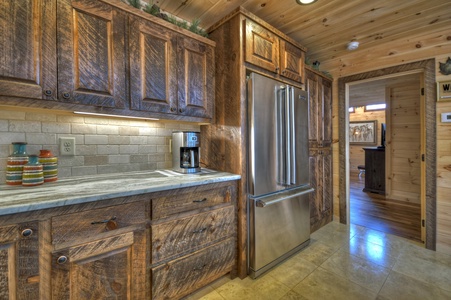 Whisky Creek Retreat-Showcasing the kitchen with large fridge