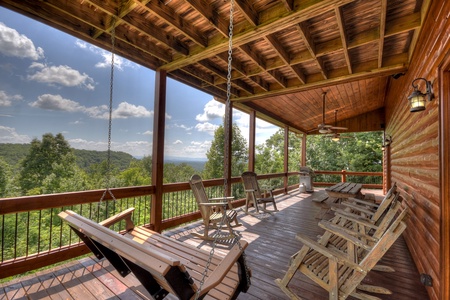 Above Ravens Ridge- Entry level deck with a swing