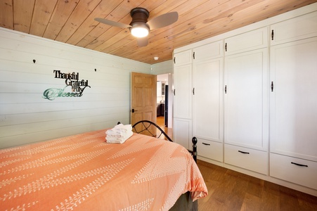 Kricket's Overlook- Entry level guest bedroom with cabinet storage