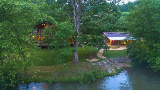 The River House- Peekaboo Aerial of Cabin and River