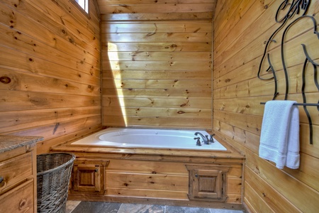 Grand Bluff Retreat- Soaker tub in the master suite bathroom