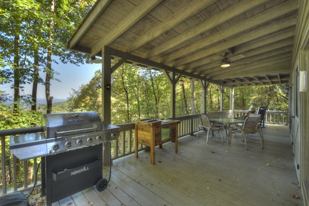 Ridgetop Pointaview- Entry level deck area with a grill and mountain views
