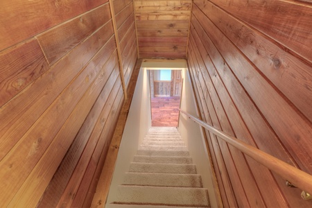 Trails End- Downstairs leading to the lower level