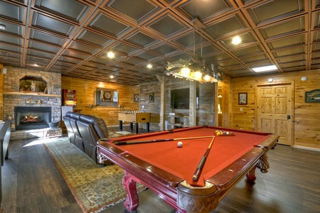 Grand Mountain Lodge- Game room with a pool table and seating area