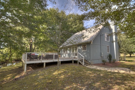 Sipping Rise -Exterior rear view of the cabin with deck access