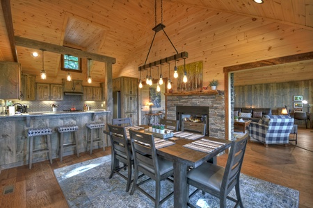 A Perfect Day- - Dining room with table, chairs and hanging light fixture