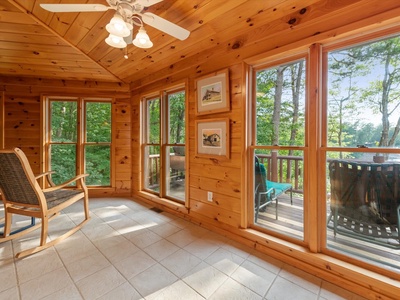 Medley Sunset Cove- Sunroom with stunning floor to ceiling lake views