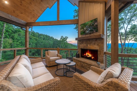 Southern Star- Fireplace seating with outdoor furniture and TV