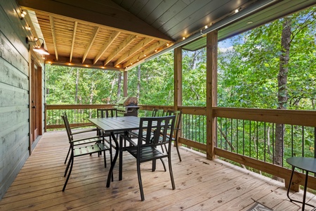 BeauJax Cabin - Main Level Covered Deck Dining Area