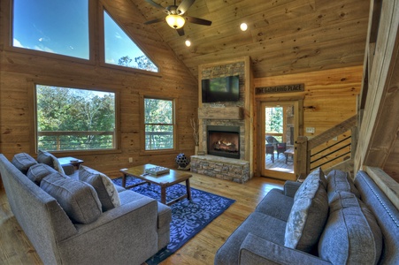 Cedar Ridge- Entry level living area with a fireplace