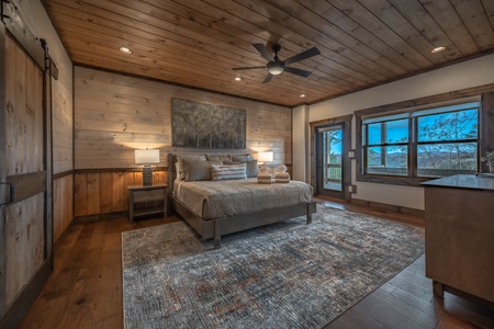 The Ridgeline Retreat- Lower level king bedroom with deck access