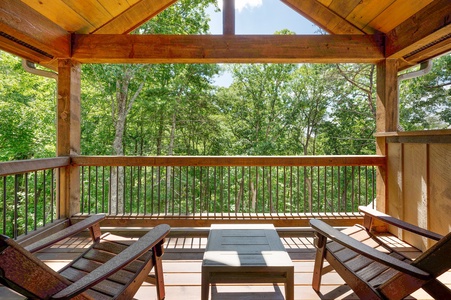 Mountain Echoes- Private balcony with forest views and outdoor seating